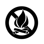 The symbol for an area where campfires are not permitted.
